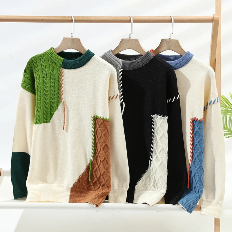 Męski sweter dzianinowy z panelami warkoczowymi typu patchwork i wykończeniem whipstitch