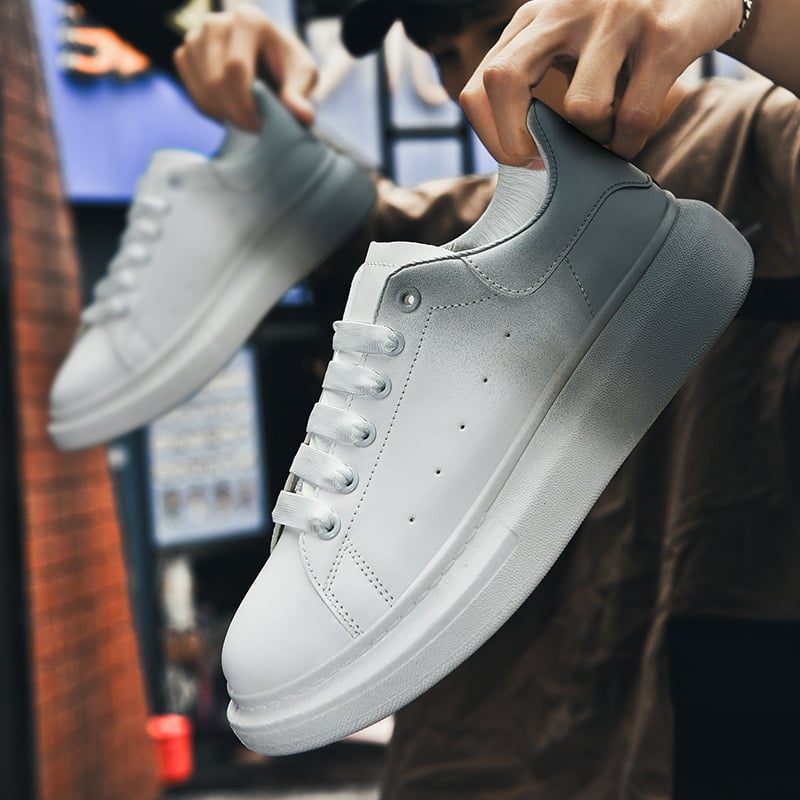 Męskie buty sportowe z okrągłym noskiem, płaską podeszwą i kolorowym przeszyciem