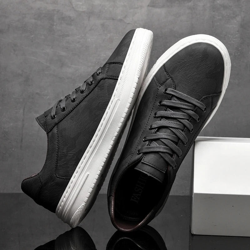 Męskie sneakersy z przeszyciami na cholewce i schludnym, wyprofilowanym kształtem